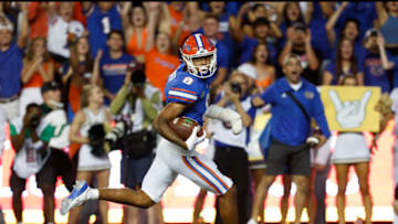 Sep 17, 2022; Gainesville, Florida, USA; Florida Gators cornerback Jalen Kimber (8) intercepts the ball and runs it back for a touchdown against the Florida Gators during the second quarter at Ben Hill Griffin Stadium. Mandatory Credit: Kim Klement-USA TODAY Sports