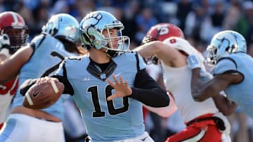 Nov 29, 2014; Chapel Hill, NC, USA; North Carolina Tar Heels quarterback Mitch Trubisky (10) throws a pass during the second half against the North Carolina State Wolfpack at Kenan Memorial Stadium. The Wolfpack won 35-7. Mandatory Credit: Rob Kinnan-USA TODAY Sports