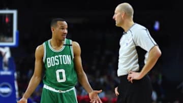Dec 26, 2015; Auburn Hills, MI, USA; Boston Celtics guard Avery Bradley (0) talks to referee Curtis Blair (74) during the fourth quarter against the Detroit Pistons at The Palace of Auburn Hills. Mandatory Credit: Tim Fuller-USA TODAY Sports