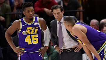 SALT LAKE CITY, UT - NOVEMBER 07: Donovan Mitchell #45 and Dante Exum #11 of the Utah Jazz listen to head coach Quinn Synder in the second half of a NBA game against the Dallas Mavericks at Vivint Smart Home Arena on November 7, 2018 in Salt Lake City, Utah. NOTE TO USER: User expressly acknowledges and agrees that, by downloading and or using this photograph, User is consenting to the terms and conditions of the Getty Images License Agreement. (Photo by Gene Sweeney Jr./Getty Images)