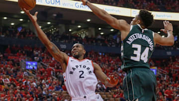 TORONTO, ON - MAY 19: Toronto Raptors forward Kawhi Leonard (2) gets another 2 after slipping past Milwaukee Bucks forward Giannis Antetokounmpo (34). Toronto Raptors vs Milwaukee Bucks in 2nd half action of Eastern Conference Final, Game 3 of NBA playoff play at Scotiabank Arena. Raptors win in double OT, 118-112. Bucks lead the series 2-1.Toronto Star/Rick Madonik (Rick Madonik/Toronto Star via Getty Images)