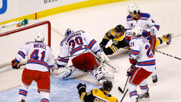 Henrik Lundqvist #30 of the New York Rangers in the second period during the season opener game on January 19, 2013 Photo by Jared Wickerham/Getty Images)