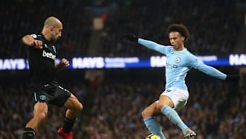 MANCHESTER, ENGLAND - DECEMBER 03: Pablo Zabaleta of West Ham United and Leroy Sane of Manchester City in action during the Premier League match between Manchester City and West Ham United at Etihad Stadium on December 3, 2017 in Manchester, England. (Photo by Clive Brunskill/Getty Images)