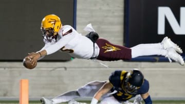 Nov 28, 2015; Berkeley, CA, USA; Arizona State Sun Devils quarterback Manny Wilkins (5) dives above California Golden Bears safety Luke Rubenzer (17) but is ruled out of bounds at the four yard line during the third quarter at Memorial Stadium. The California Golden Bears defeated the Arizona State Sun Devils 48-46. Mandatory Credit: Kelley L Cox-USA TODAY Sports