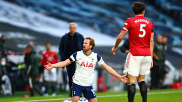 LONDON, ENGLAND - APRIL 11: Harry Kane of Tottenham Hotspur reacts after a challenge by Harry Maguire of Manchester United during the Premier League match between Tottenham Hotspur and Manchester United at Tottenham Hotspur Stadium on April 11, 2021 in London, England. (Photo by Clive Rose/Getty Images)