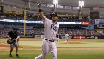 Jul 26, 2014; St. Petersburg, FL, USA; Tampa Bay Rays second baseman Ben Zobrist (18) reacts after he hit a solo home run during the seventh inning against the Boston Red Sox at Tropicana Field. Mandatory Credit: Kim Klement-USA TODAY Sports