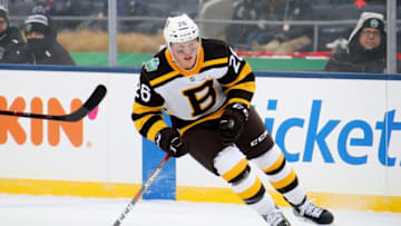 SOUTH BEND, INDIANA - JANUARY 01: Colby Cave #26 of the Boston Bruins skates in the second period against the Chicago Blackhawks during the 2019 Bridgestone NHL Winter Classic at Notre Dame Stadium on January 01, 2019 in South Bend, Indiana. (Photo by Gregory Shamus/Getty Images)
