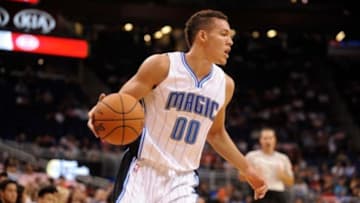Oct 22, 2014; Orlando, FL, USA; Orlando Magic forward Aaron Gordon (00) dribbles up court against the Houston Rockets at Amway Center. Mandatory Credit: David Manning-USA TODAY Sports