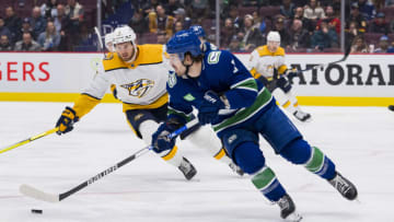 Mar 6, 2023; Vancouver, British Columbia, CAN; Vancouver Canucks forward Conor Garland (8) handles the puck against the Nashville Predators in the second period at Rogers Arena. Mandatory Credit: Bob Frid-USA TODAY Sports