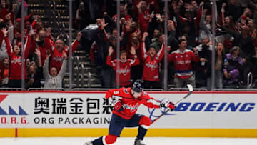 WASHINGTON, DC - NOVEMBER 29: Dmitry Orlov #9 of the Washington Capitals celebrates after scoring the game-winning goal in overtime against the Tampa Bay Lightning at Capital One Arena on November 29, 2019 in Washington, DC. (Photo by Patrick McDermott/NHLI via Getty Images)