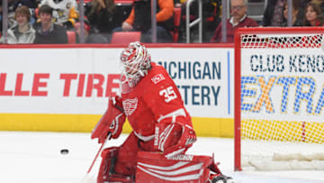 DETROIT, MI - MARCH 27: Jimmy Howard #35 of the Detroit Red Wings blocks this shot wide of the net during the Detroit Red Wings game versus the Pittsburgh Penguins on March 27, 2018, at Little Caesars Arena in Detroit, Michigan. (Photo by Steven King/Icon Sportswire via Getty Images)