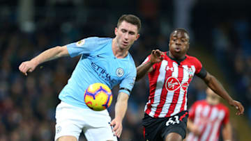 MANCHESTER, ENGLAND - NOVEMBER 04: Aymeric Laporte of Manchester City battles for possession with Michael Obafemi of Southampton during the Premier League match between Manchester City and Southampton FC at Etihad Stadium on November 4, 2018 in Manchester, United Kingdom. (Photo by Alex Livesey/Getty Images)