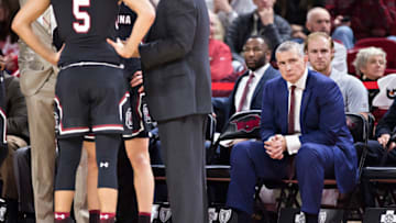 FAYETTEVILLE, AR - FEBRUARY 6: Head Coach Frank Martin of the South Carolina Gamecocks sits on the bench during a time out during a game against the Arkansas Razorbacks at Bud Walton Arena on February 6, 2018 in Fayetteville, Arkansas. The Razorbacks defeated the Gamecocks 81-65. (Photo by Wesley Hitt/Getty Images)