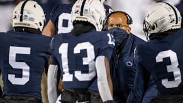 STATE COLLEGE, PA - OCTOBER 31: Head coach James Franklin of the Penn State Nittany Lions speaks to Jahan Dotson #5, KeAndre Lambert-Smith #13, and Parker Washington #3 during the second half at Beaver Stadium on October 31, 2020 in State College, Pennsylvania. (Photo by Scott Taetsch/Getty Images)