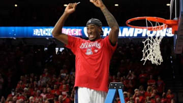 Mar 7, 2015; Tucson, AZ, USA; Arizona Wildcats forward Rondae Hollis-Jefferson (23) cuts down the net after beating the Stanford Cardinal at McKale Center. Arizona won 69-91. Mandatory Credit: Casey Sapio-USA TODAY Sports