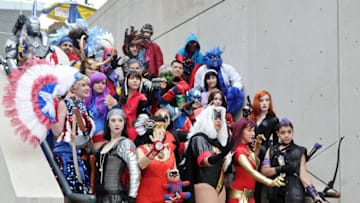 Comic Con attendees pose as X-Men characters (Photo by Daniel Zuchnik/Getty Images)