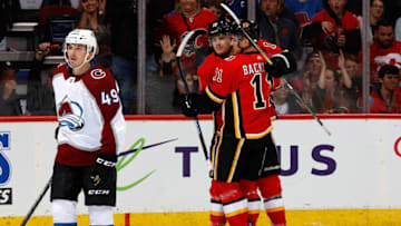 CALGARY, AB - NOVEMBER 1: Mikael Backlund #11 and teammates of the Calgary Flames celebrate a goal against the Colorado Avalanche during an NHL game on November 1, 2018 at the Scotiabank Saddledome in Calgary, Alberta, Canada. (Photo by Gerry Thomas/NHLI via Getty Images)