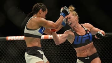 Jul 15, 2015; San Diego, CA, USA; Holly Holm (red) fights Marion Reneau (blue) during UFC Fight Night at Valley View Casino Center. Mandatory Credit: Jake Roth-USA TODAY Sports