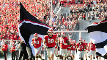 ATHENS, GA - OCTOBER 15: Ryland Goede #88 of the Georgia Bulldogs leads the team through the banner against the Vanderbilt Commodores at Sanford Stadium on October 15, 2022 in Athens, Georgia. (Photo by Adam Hagy/Getty Images)