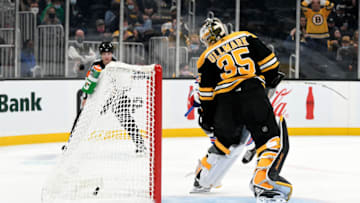 Oct 2, 2021; Boston, Massachusetts, USA; Boston Bruins goaltender Linus Ullmark (35) looks back into the net after a goal was scored by New York Rangers left wing Alexis Lafrenière (not seen) during an overtime period at the TD Garden. Mandatory Credit: Brian Fluharty-USA TODAY Sports