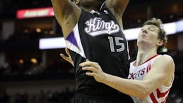 April 14, 2013; Houston, TX, USA; Sacramento Kings center DeMarcus Cousins (15) takes a shot against the Houston Rockets in the third quarter at the Toyota Center. The Rockets defeated the Kings 121-100. Mandatory Credit: Brett Davis-USA TODAY Sports