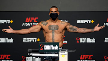 LAS VEGAS, NEVADA - OCTOBER 01: In this handout photo provided by UFC, Thiago Santos of Brazil poses on the scale during the UFC Fight Night weigh-in at UFC APEX on October 01, 2021 in Las Vegas, Nevada. (Photo by Jeff Bottari/Zuffa LLC via Getty Images)