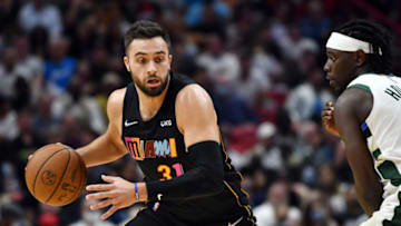 Miami Heat guard Max Strus (31) brings the ball up in the fourth as Milwaukee Bucks guard Jrue Holiday (21) defends(Jim Rassol-USA TODAY Sports)