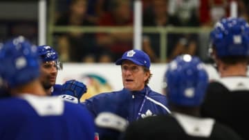 LUCAN, ON - SEPTEMBER 18: Head coach Mike Babcock of the Toronto Maple Leafs talks to his players during a morning skate at Kraft Hockeyville Canada at the Lucan Community Memorial Centre on September 18, 2018 in Lucan, Ontario, Canada. (Photo by Mark Blinch/NHLI via Getty Images)