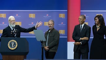 JOINT BASE ANDREWS, MD - MAY 5: L to R, David Letterman speaks as comedian Jon Stewart, President Barack Obama and First Lady Michelle Obama look on during a comedy show organized by United Services Organizations (USO) for members of the military and their families, at Andrews Air Force Base, May 5, 2016, in Joint Base Andrews, Maryland. The program is also being live streamed for active duty service members stationed at bases domestically and abroad. (Photo by Drew Angerer/Getty Images)