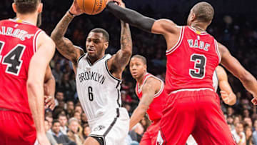 Oct 31, 2016; Brooklyn, NY, USA; Chicago Bulls guard Dwyane Wade (3) fouls Brooklyn Nets guard Sean Kilpatrick (6) during the fourth quarter at Barclays Center. The Bulls won 118-88. Mandatory Credit: Dennis Schneidler-USA TODAY Sports
