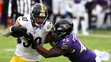 BALTIMORE, MARYLAND - NOVEMBER 01: Running back James Conner #30 of the Pittsburgh Steelers is tackled by linebacker Jaylon Ferguson #45 of the Baltimore Ravens in the third quarter at M&T Bank Stadium on November 01, 2020 in Baltimore, Maryland. (Photo by Todd Olszewski/Getty Images)