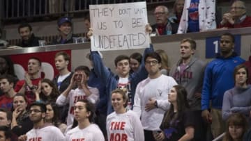 Jan 19, 2016; Dallas, TX, USA; A SMU Mustangs fan holds up a sign from the stands during the second half against the Houston Cougars at Moody Coliseum. The Mustangs won 77-73. Mandatory Credit: Jerome Miron-USA TODAY Sports