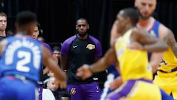 ANAHEIM, CA - OCTOBER 06: LeBron James #23 of the Los Angeles Lakers looks on from the bench during the second half of a NBA preseason game against the LA Clippers at Honda Center on October 6, 2018 in Anaheim, California. NOTE TO USER: User expressly acknowledges and agrees that, by downloading and or using this photograph, User is consenting to the terms and conditions of the Getty Images License Agreement. (Photo by Sean M. Haffey/Getty Images)
