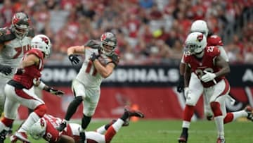 Sep 18, 2016; Glendale, AZ, USA; Tampa Bay Buccaneers wide receiver Adam Humphries (11) runs after making a catch against the Arizona Cardinals at University of Phoenix Stadium. The Cardinals won 40-7. Mandatory Credit: Joe Camporeale-USA TODAY Sports