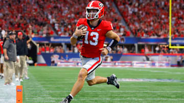 ATLANTA, GA - SEPTEMBER 03: Stetson Bennett #13 of the Georgia Bulldogs rushes in for a touchdown during the first half against the Oregon Ducks at Mercedes-Benz Stadium on September 3, 2022 in Atlanta, Georgia. (Photo by Todd Kirkland/Getty Images)