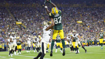 Aug 19, 2022; Green Bay, Wisconsin, USA; Green Bay Packers wide receiver Romeo Doubs (87) catches a pass to score a touchdown during the second quarter against the New Orleans Saints at Lambeau Field. Mandatory Credit: Jeff Hanisch-USA TODAY Sports