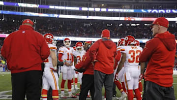 Jan 16, 2016; Foxborough, MA, USA; Kansas City Chiefs players huddle on the sidelines against the New England Patriots during the first half in the AFC Divisional round playoff game at Gillette Stadium. Mandatory Credit: David Butler II-USA TODAY Sports