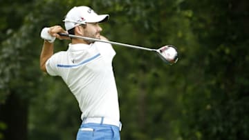 Jun 24, 2016; Bethesda, MD, USA; Adam Hadwin of Canada hits his tee shot on the fourteenth hole during the second round of the Quicken Loans National golf tournament. at Congressional Country Club - Blue Course. Mandatory Credit: Geoff Burke-USA TODAY Sports