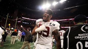 ATLANTA, GA - JANUARY 08: Raekwon Davis #99 of the Alabama Crimson Tide celebrates after beating the Georgia Bulldogs in overtime to win the CFP National Championship presented by AT&T at Mercedes-Benz Stadium on January 8, 2018 in Atlanta, Georgia. The Alabama Crimson Tide won 26-23. (Photo by Christian Petersen/Getty Images)