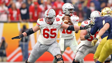 Jan 1, 2016; Glendale, AZ, USA; Ohio State Buckeyes offensive lineman Pat Elflein (65) against the Notre Dame Fighting Irish during the 2016 Fiesta Bowl at University of Phoenix Stadium. The Buckeyes defeated the Fighting Irish 44-28. Mandatory Credit: Mark J. Rebilas-USA TODAY Sports