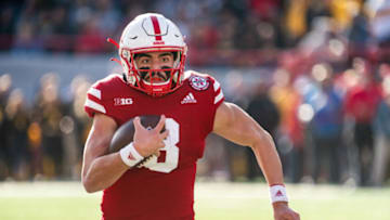Nov 26, 2021; Lincoln, Nebraska, USA; Nebraska Cornhuskers quarterback Logan Smothers (8) runs with the ball during the second quarter against the Iowa Hawkeyes at Memorial Stadium. Mandatory Credit: Dylan Widger-USA TODAY Sports