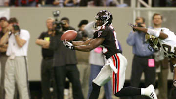 09 Dec 2001 : Terance Mathis of the Atlanta Falcons tries to secure a pass during the game against the New Orleans Saints at the Georgia Dome in Atlanta, Georgia. The Saints won 28-10. DIGITAL IMAGE. Mandatory Credit: Jamie Squire/Allsport