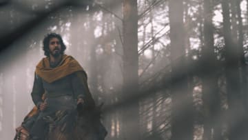 Dev Patel in The Green Knight -- Photo by: Eric Zachanowich / A24 Films