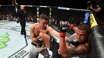 ANAHEIM, CALIFORNIA - AUGUST 17: (L-R) Nate Diaz punches Anthony Pettis in their welterweight bout during the UFC 241 event at the Honda Center on August 17, 2019 in Anaheim, California. (Photo by Josh Hedges/Zuffa LLC/Zuffa LLC via Getty Images)