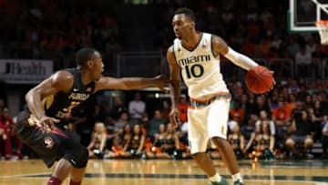 Jan 9, 2016; Coral Gables, FL, USA; Miami Hurricanes guard Sheldon McClellan (10) dribbles the ball as Florida State Seminoles guard Montay Brandon (32) defends during the second half at BankUnited Center. The Hurricanes won 72-59. Mandatory Credit: Steve Mitchell-USA TODAY Sports