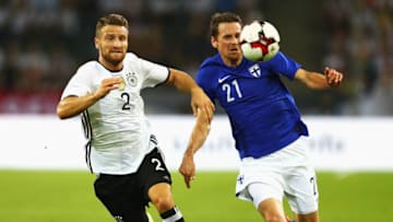 MOENCHENGLADBACH, GERMANY - AUGUST 31: Kasper Hamalainen of Finland is closed down by Shkodran Mustafi of Germany during the International Friendly match between Germany and Finland at Borussia-Park on August 31, 2016 in Moenchengladbach, Germany. (Photo by Lars Baron/Bongarts/Getty Images)