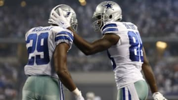 Sep 28, 2014; Arlington, TX, USA; Dallas Cowboys running back DeMarco Murray (29) celebrates a third quarter touchdown with receiver Dez Bryant (88) against the New Orleans Saints at AT&T Stadium. Mandatory Credit: Matthew Emmons-USA TODAY Sports