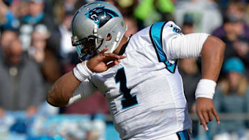 CHARLOTTE, NC - JANUARY 17: Cam Newton #1 of the Carolina Panthers shows his trademark "dab" against the Seattle Seahawks in the 2nd quarter during the NFC Divisional Playoff Game at Bank of America Stadium on January 17, 2016 in Charlotte, North Carolina. (Photo by Grant Halverson/Getty Images)