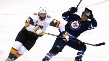 WINNIPEG, MB - MAY 14: Pierre-Edouard Bellemare #41 of the Vegas Golden Knights skates against Brandon Tanev #13 of the Winnipeg Jets during the third period in Game Two of the Western Conference Finals during the 2018 NHL Stanley Cup Playoffs at Bell MTS Place on May 14, 2018 in Winnipeg, Canada. The Vegas Golden Knights defeated the Winnipeg Jets 3-1. (Photo by Jason Halstead/Getty Images)