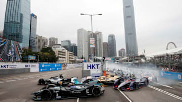 HONG KONG, HONG KONG - MARCH 10: Oliver Rowland (GBR), Nissan e.Dams, Nissan IMO1, passes Stoffel Vandoorne (BEL), HWA Racelab, VFE-05, at the start of the race on March 10, 2019 in Hong Kong, Hong Kong. (Photo by FIA ABB Formula E/Handout/Getty Images)